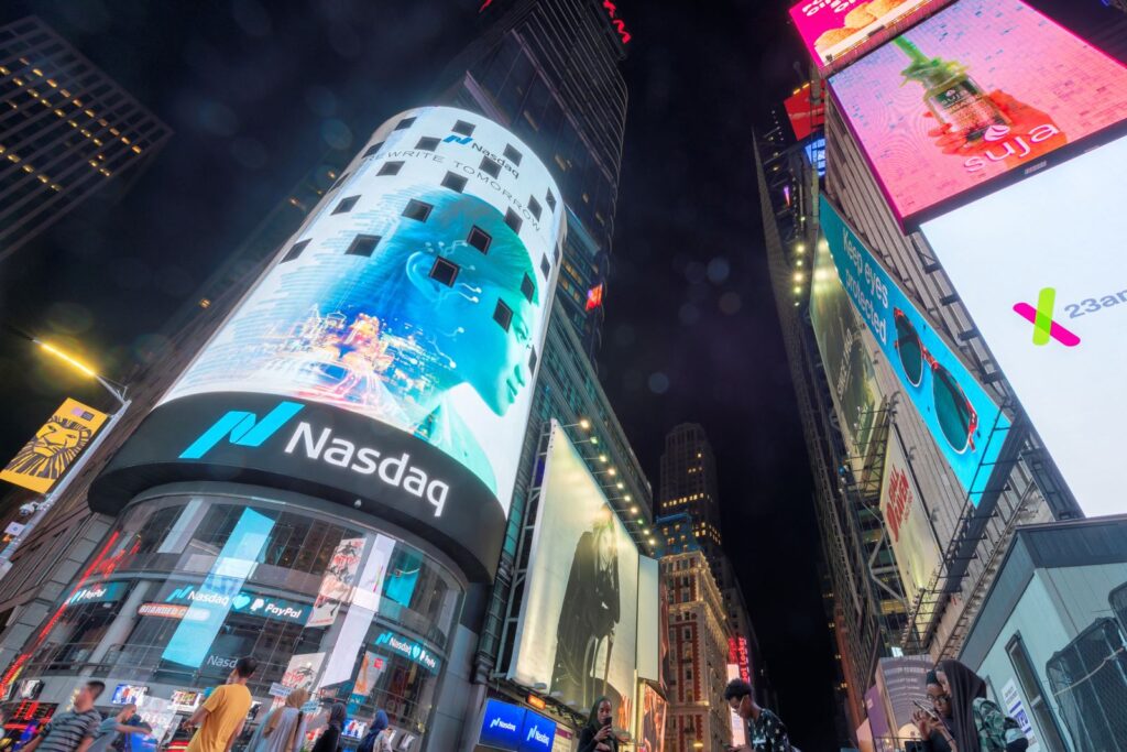 Stocks Settle Sharply Higher as Crude Prices Plunge and Chipmakers Soar
